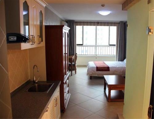 Циньхуандао: Nandaihe Zilanxiangjun Seaview Apartment