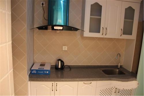 Циньхуандао: Nandaihe Zilanxiangjun Seaview Apartment