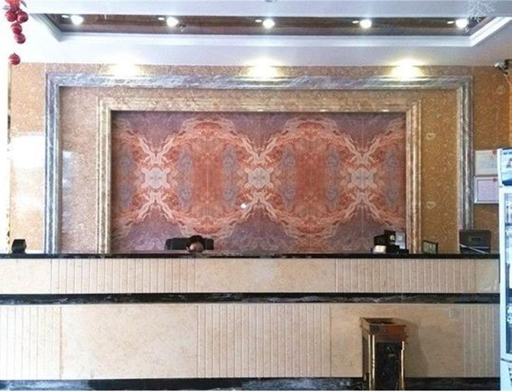 Ваньнин: Wanning Minghuang Business Hotel