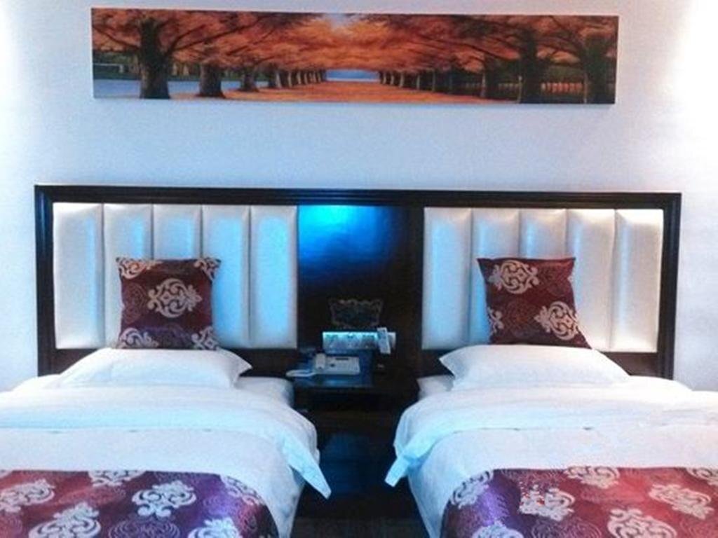 Ваньнин: Wanning Minghuang Business Hotel