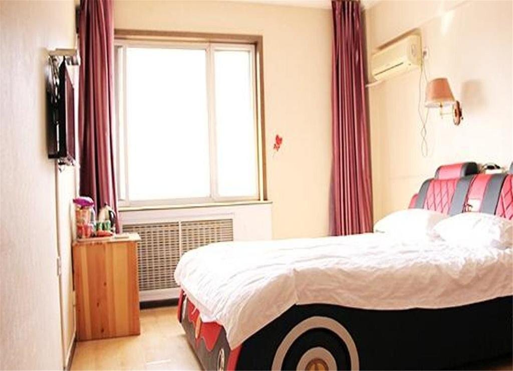 Чэндэ: Chengde Xinhe 521 Theme Hotel
