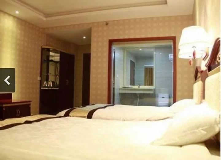 Цзинхун: Xishuangbanna Zhongrui Business Hotel