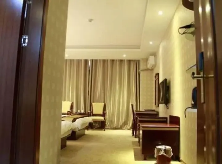 Цзинхун: Xishuangbanna Zhongrui Business Hotel