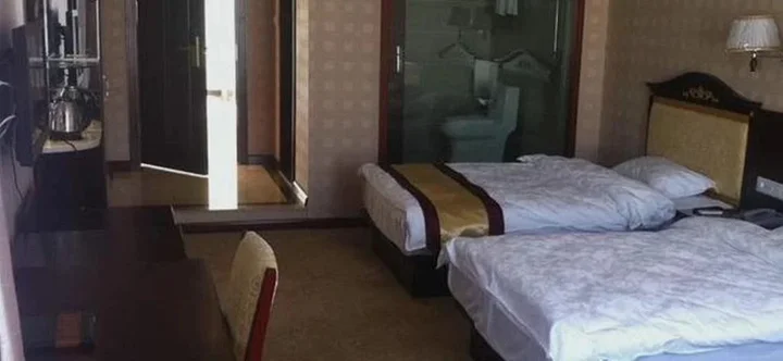Цзинхун: Xishuangbanna Zhongrui Business Hotel