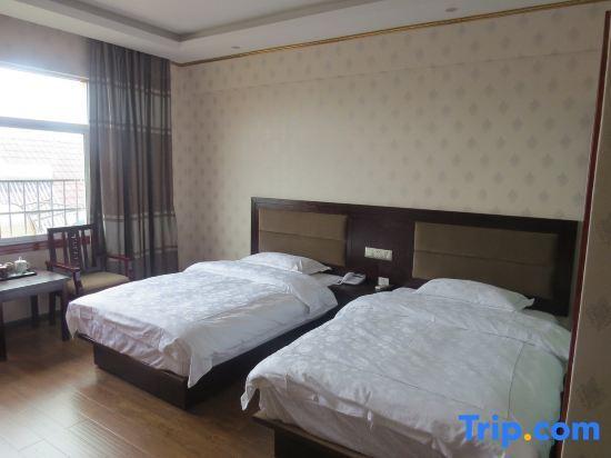 Цзинхун: Xishuangbanna Dibo'er Hotel