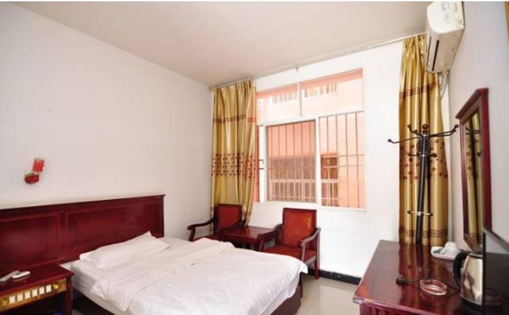 Цзинхун: Jinghong Yuerongzhuang Hotel
