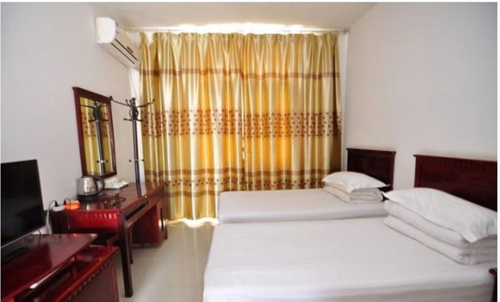 Цзинхун: Jinghong Yuerongzhuang Hotel