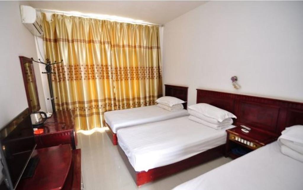 Цзинхун: Jinghong Yuerongzhuang Hotel
