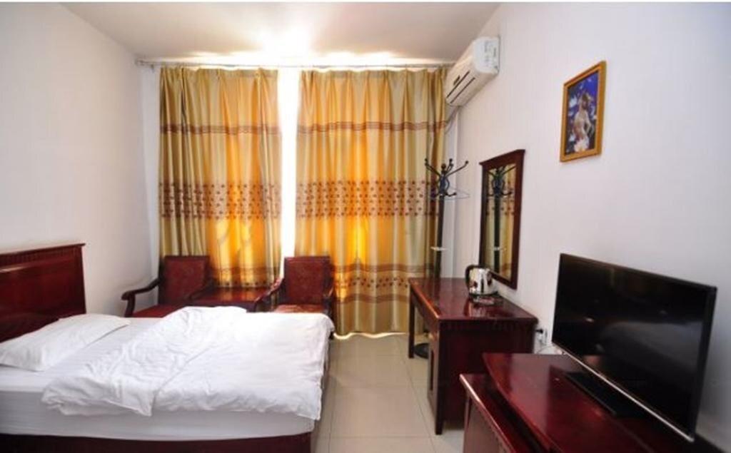 Цзинхун: Jinghong Yuerongzhuang Hotel