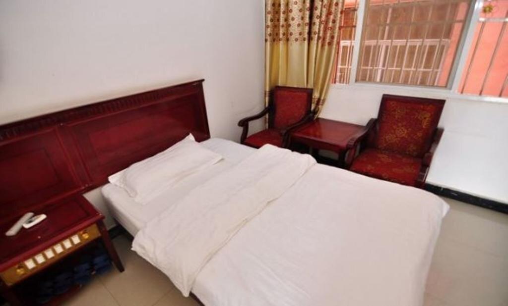 Цзинхун: Jinghong Yuerongzhuang Hotel