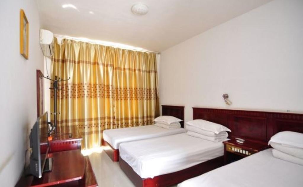 Цзинхун: Jinghong Yuerongzhuang Hotel