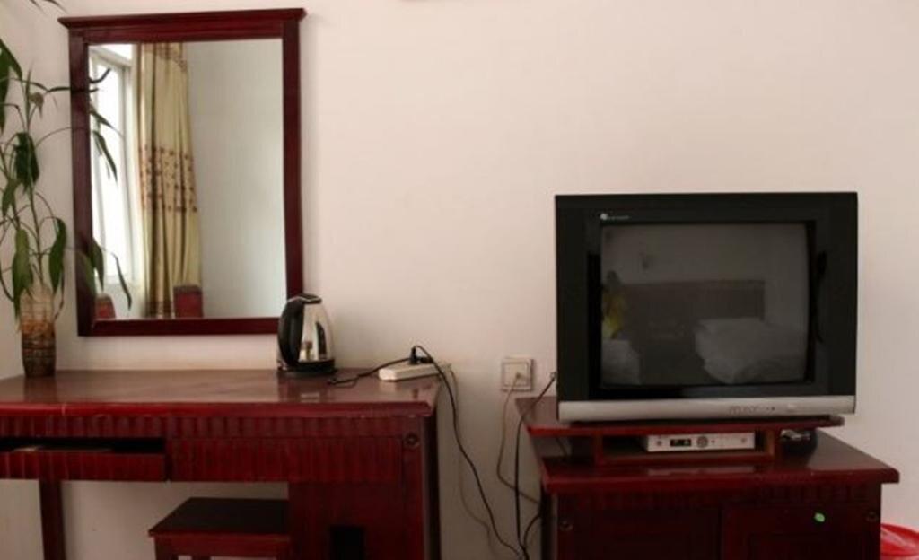 Цзинхун: Jinghong Yuerongzhuang Hotel