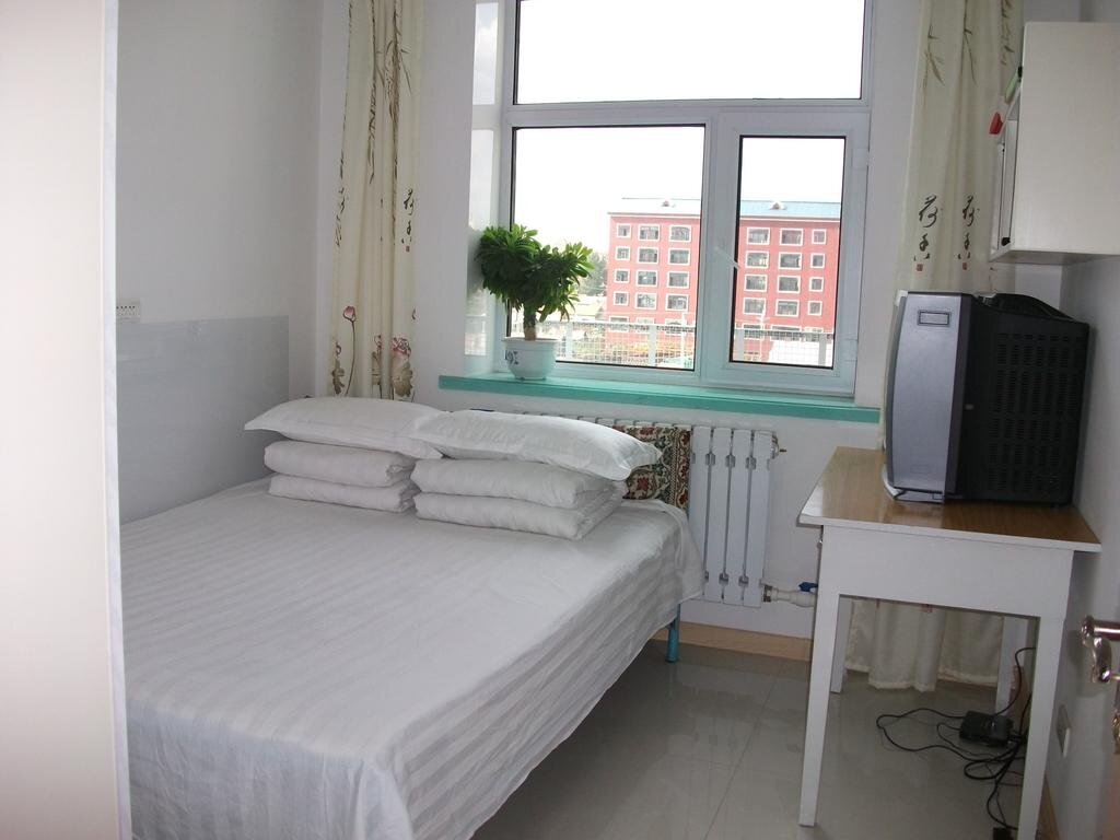 Хулун-Буир: Mengxing Home Inn