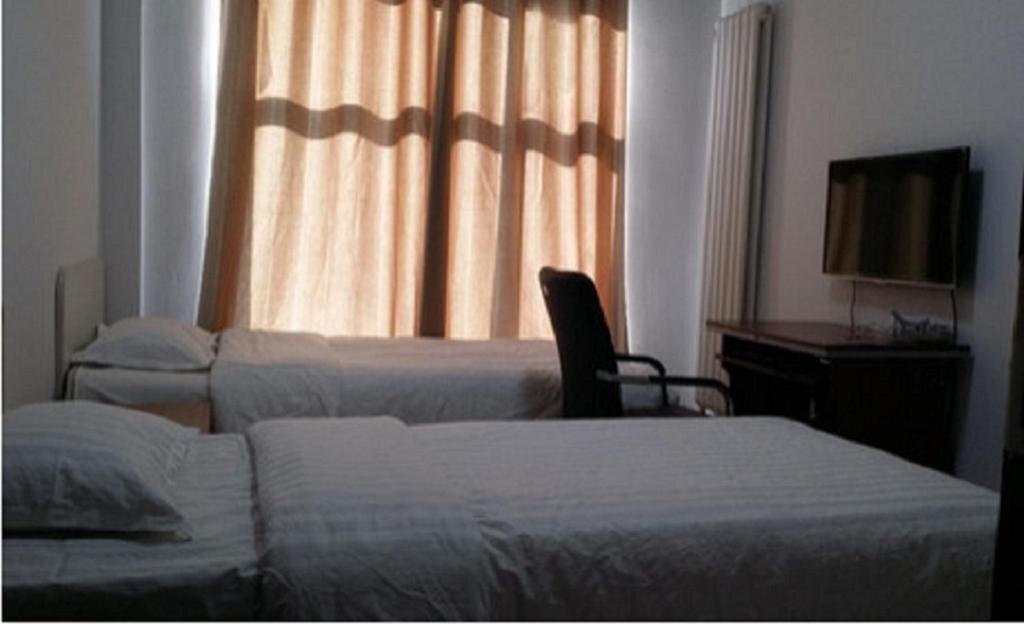 Хулун-Буир: Xinjiayuan Home Inn