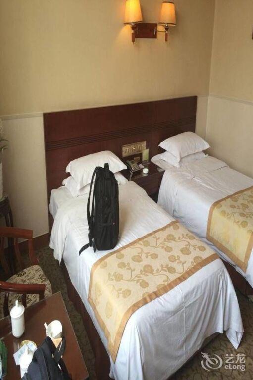 Линьи: Yonghe Business Hotel