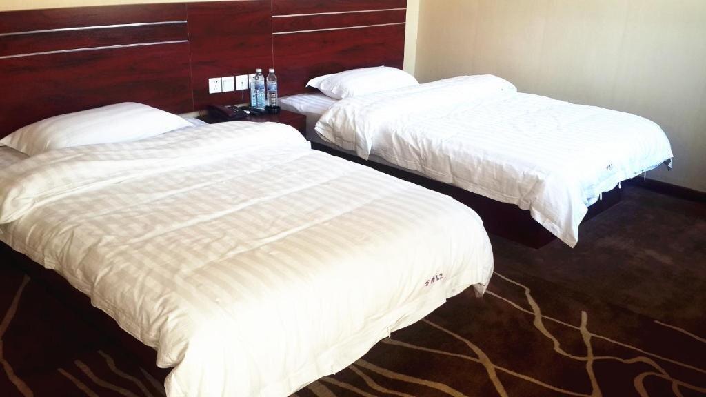 Циндао: Wanlong Business Hotel