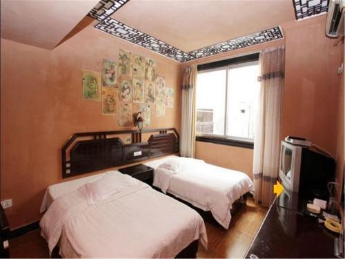 Яншо: Отель Yangshuo Jiangbian Inn