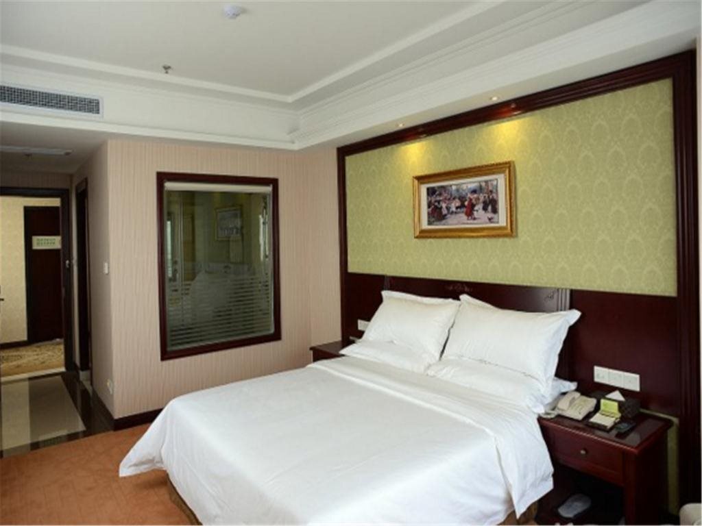 Шанхай: Vienna International Hotel Shanghai Pudong Huinan