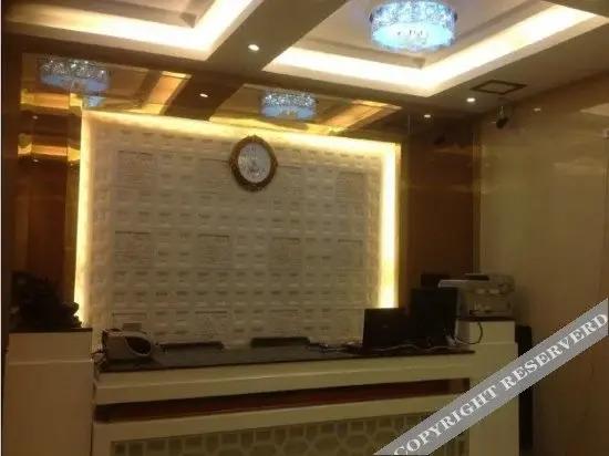 Яншо: Xiesanjie Business Hotel