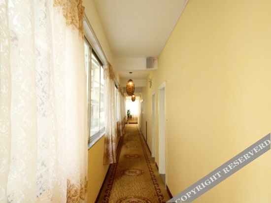 Яншо: Xiesanjie Business Hotel