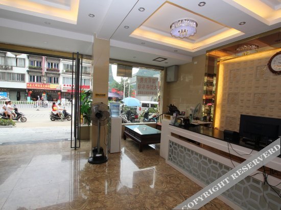 Яншо: Xiesanjie Business Hotel
