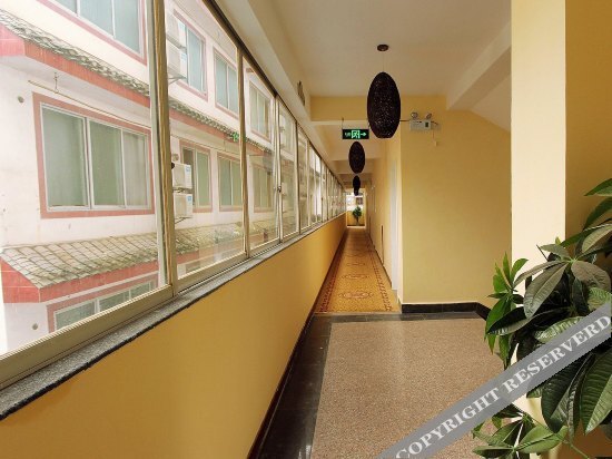 Яншо: Xiesanjie Business Hotel