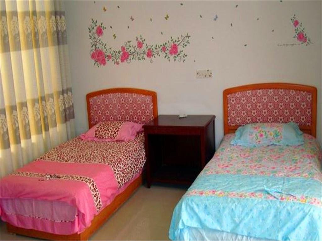 Цзюцюань: Jiuquan Dunhuang Mengtu Youth Inn