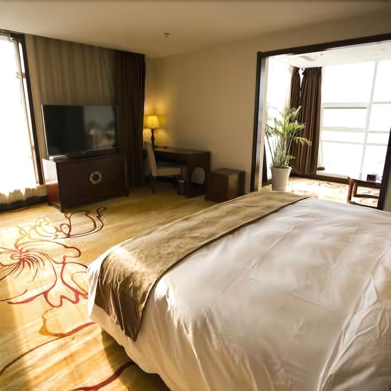 Цзинин: Sunny World Hotel
