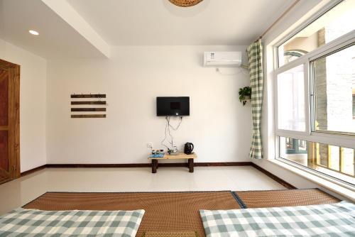 Циньхуандао: Beidaihe Chenjuzhenyuan Tang Style Inn
