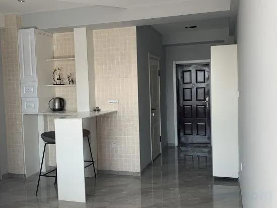 Харбин: Xinyi Apartment