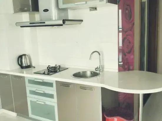 Харбин: Xinyi Apartment