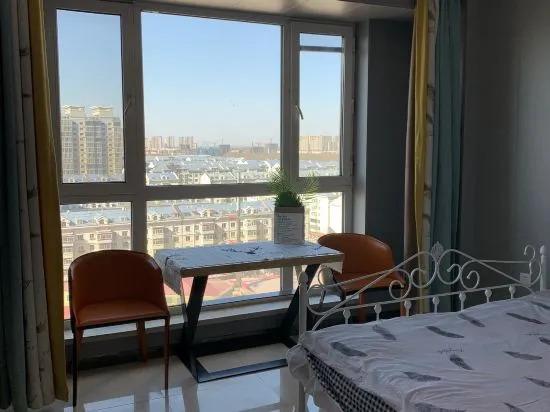 Харбин: Xinyi Apartment