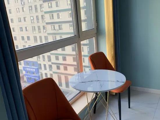 Харбин: Xinyi Apartment