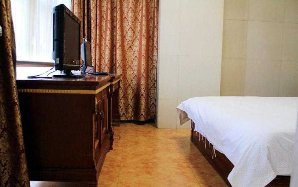 Нанкин: Kending Hotel Heping Studios Branch