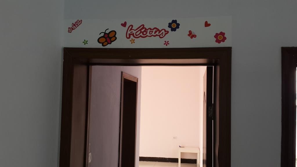 Эньши: Yiju Hostel