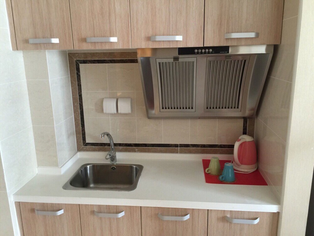 Далянь: Dalian Aolai Hotel Apartment