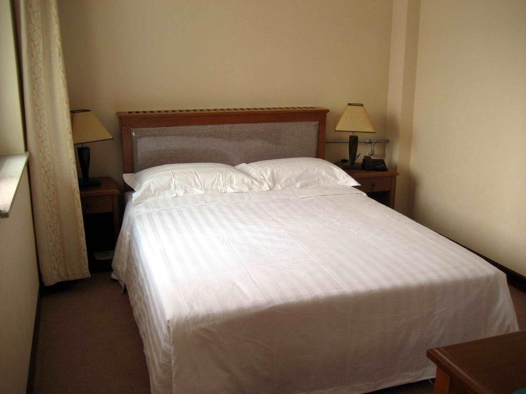 Пекин: New Travel Hotel - Beijing