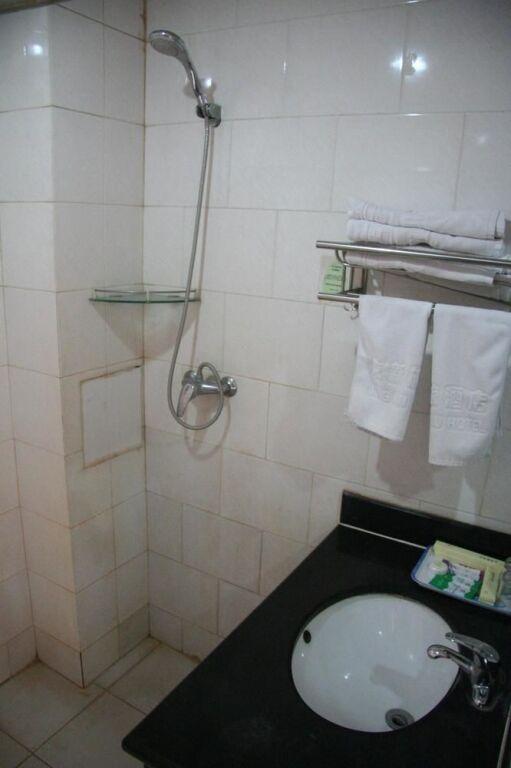 Пекин: New Travel Hotel - Beijing