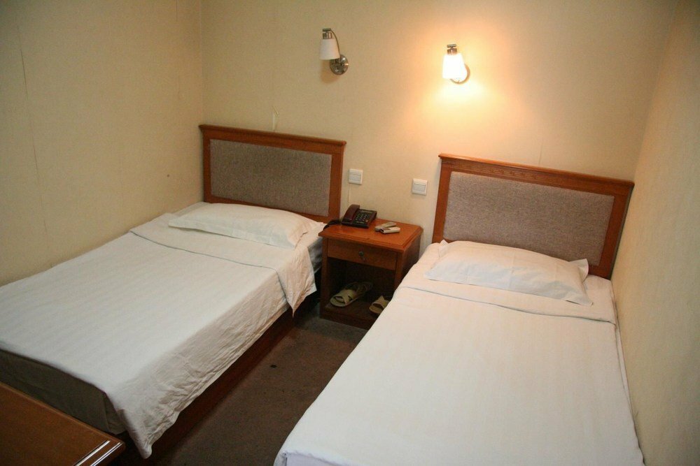 Пекин: New Travel Hotel - Beijing