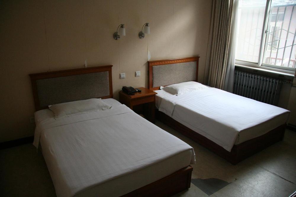 Пекин: New Travel Hotel - Beijing