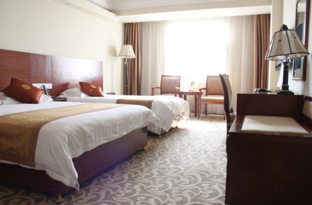 Jiujiang Huaqi Holiday Hotel — фото 1
