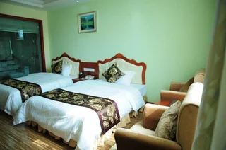 Цзинхун: Goldmet Inn Xishuangbanna New Bridge
