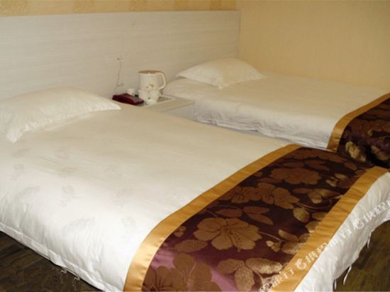Эньши: Jinyuan Business Hotel