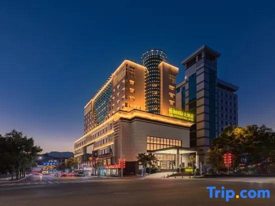 Эньши: Yihe International Hotel