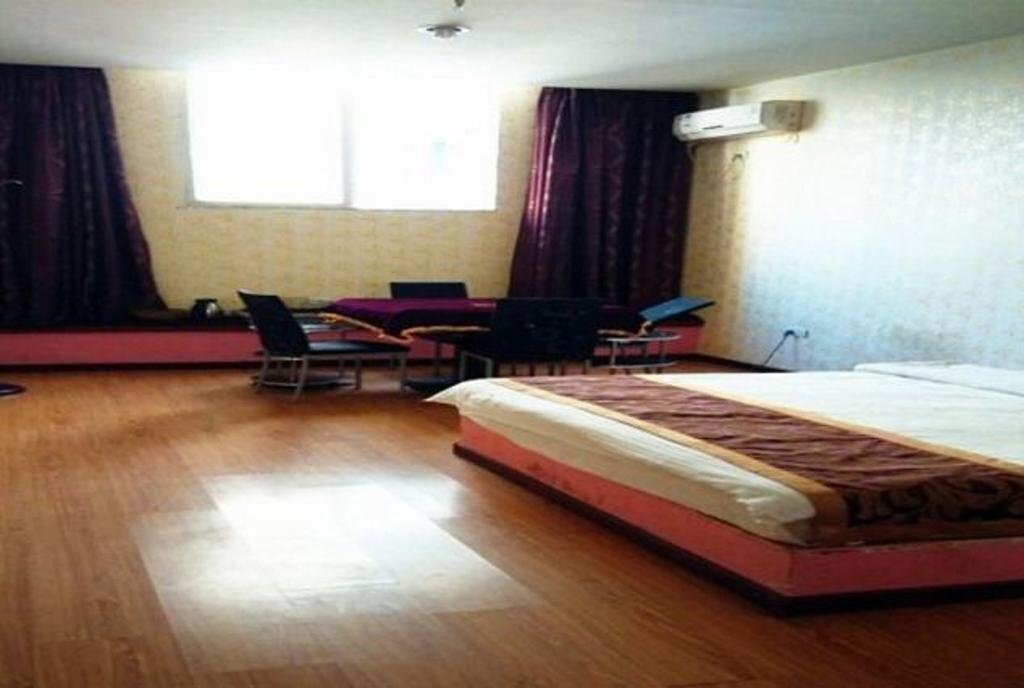 Гуангхан: Jinjiang Inn