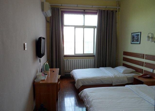 Бинжоу: Binzhou Jianing Inn