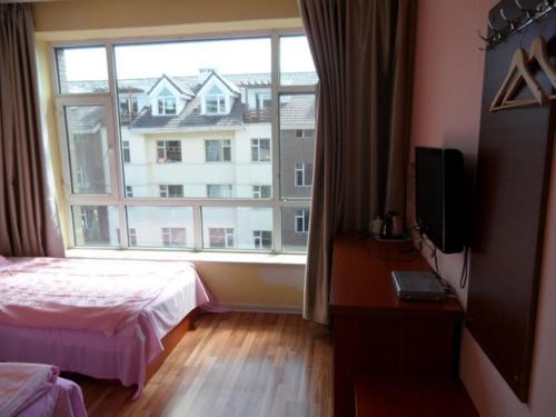 Байшань: Changbai Mountain Cuihumingyuan Apartment