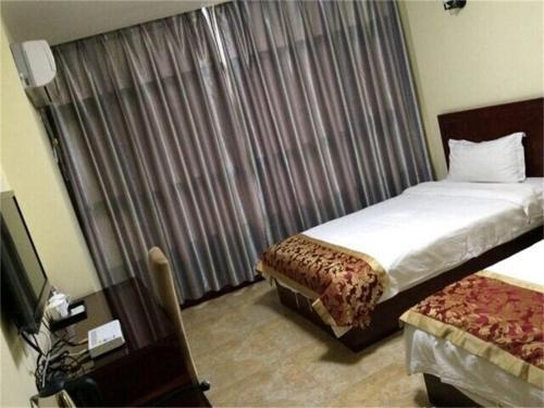 Таньтонг: Jiamei Business Inn