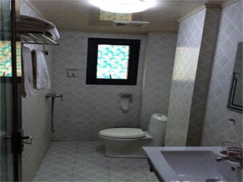 Таньтонг: Jiamei Business Inn