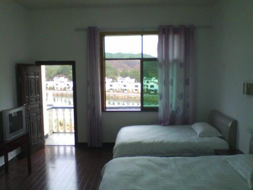 Шанграо: Wuyuan Lvxing Homestay
